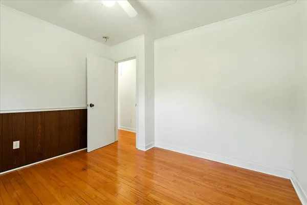 a utility room with cabinets washer and dryer