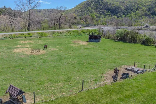 a view of a dry yard with mountain