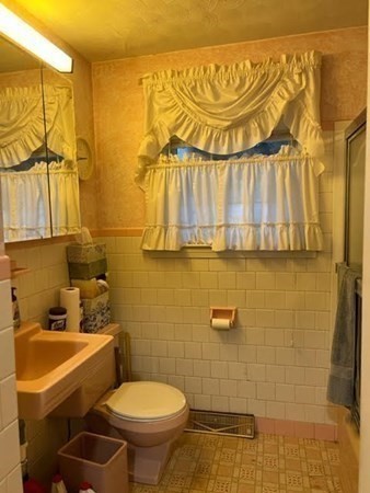 40 Old Bolton Road Hudson, MA 01749 - Photo 7 of 8 a bathroom with a sink and a toilet