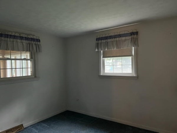 40 Old Bolton Road Hudson, MA 01749 - Photo 8 of 8 an empty room with a window