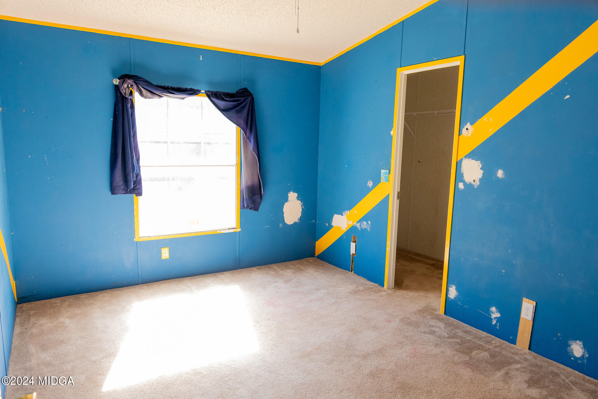4687 Boxankle Road Jackson, GA 30233 - Photo 15 of 37 a view of an empty room with a windows