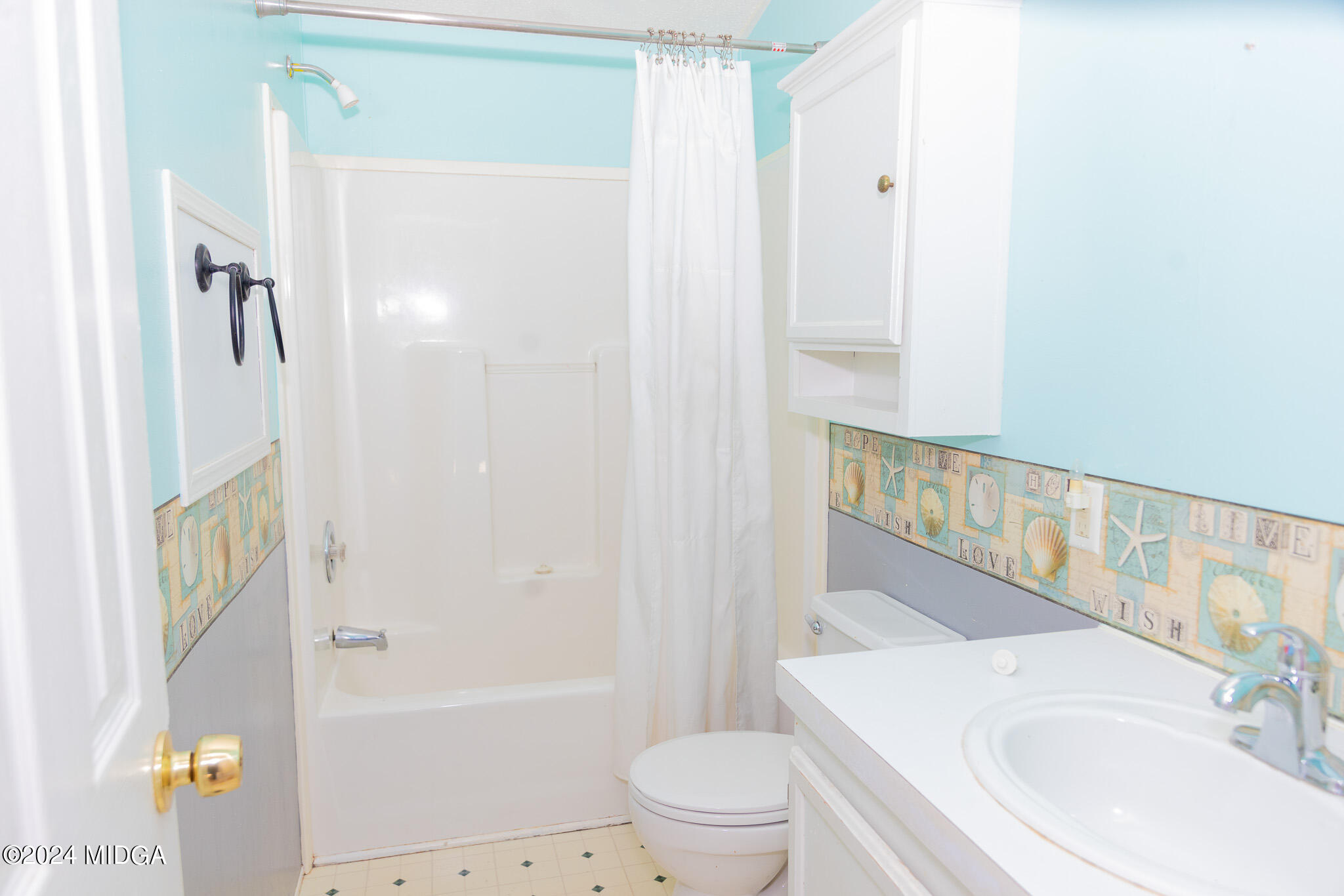 4687 Boxankle Road Jackson, GA 30233 - Photo 19 of 37 a bathroom with a sink a toilet and shower