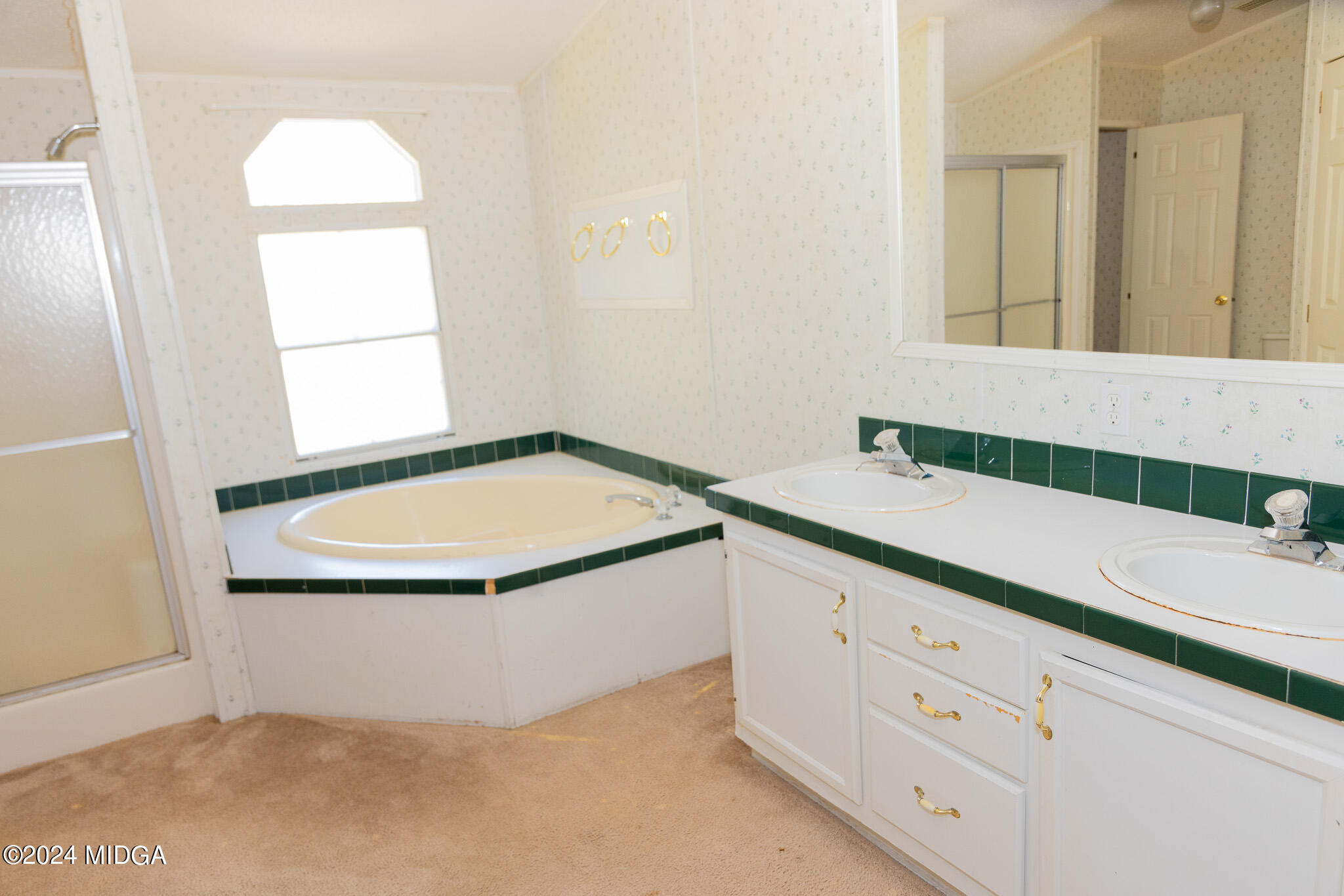 4687 Boxankle Road Jackson, GA 30233 - Photo 28 of 37 a bathroom with a sink and a mirror