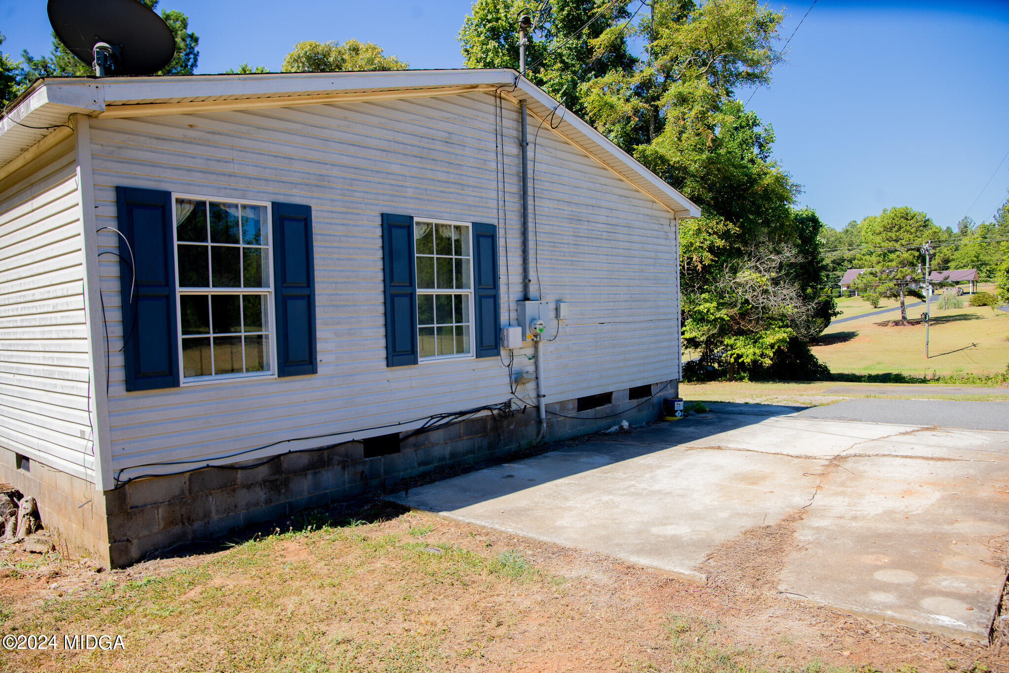 4687 Boxankle Road Jackson, GA 30233 - Photo 35 of 37 a front view of a house with a yard