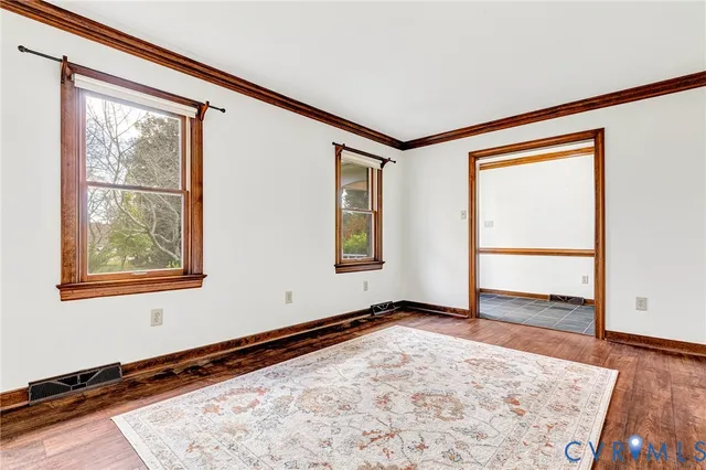 a view of an empty room and window