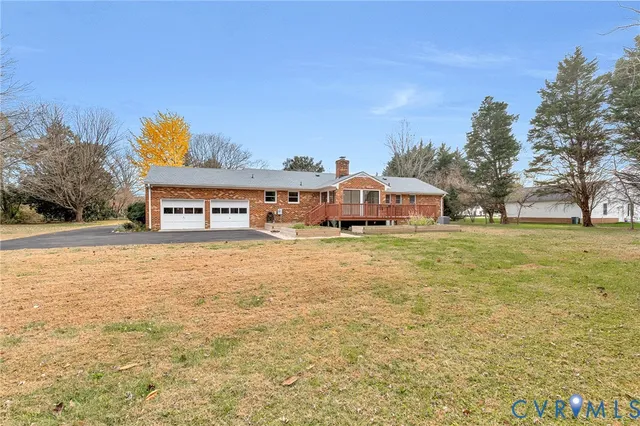 a view of a chairs and table on the wooden floor