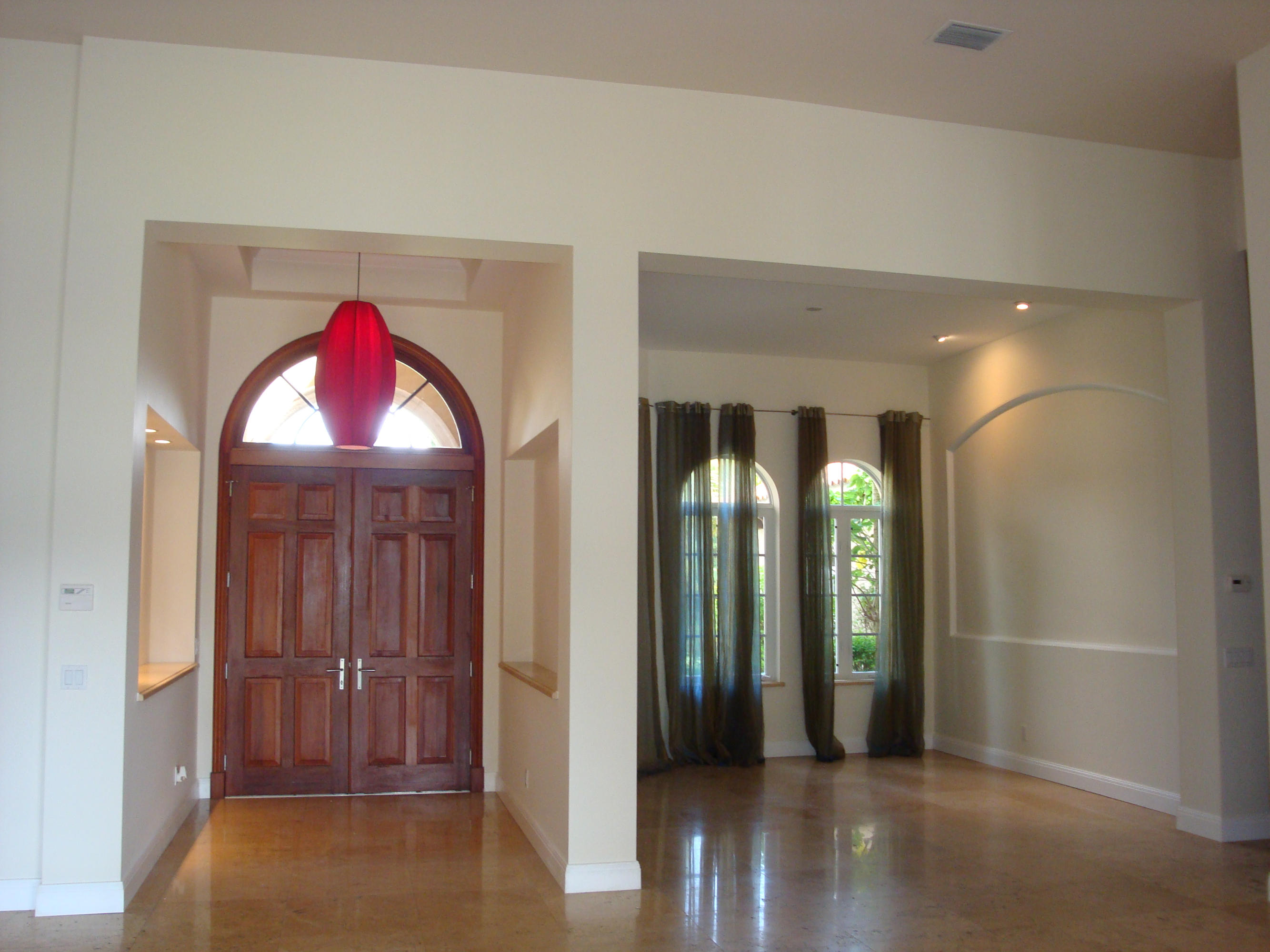 8246 Southeast Country Estates Way Jupiter, FL 33458 - Photo 13 of 48 Foyer and Dining Room