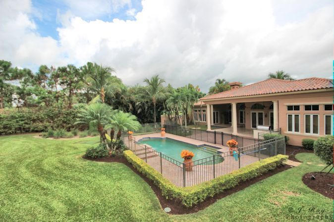 8246 Southeast Country Estates Way Jupiter, FL 33458 - Photo 45 of 48 Rear pool view