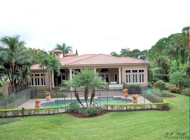 8246 Southeast Country Estates Way Jupiter, FL 33458 - Photo 46 of 48 Rear view