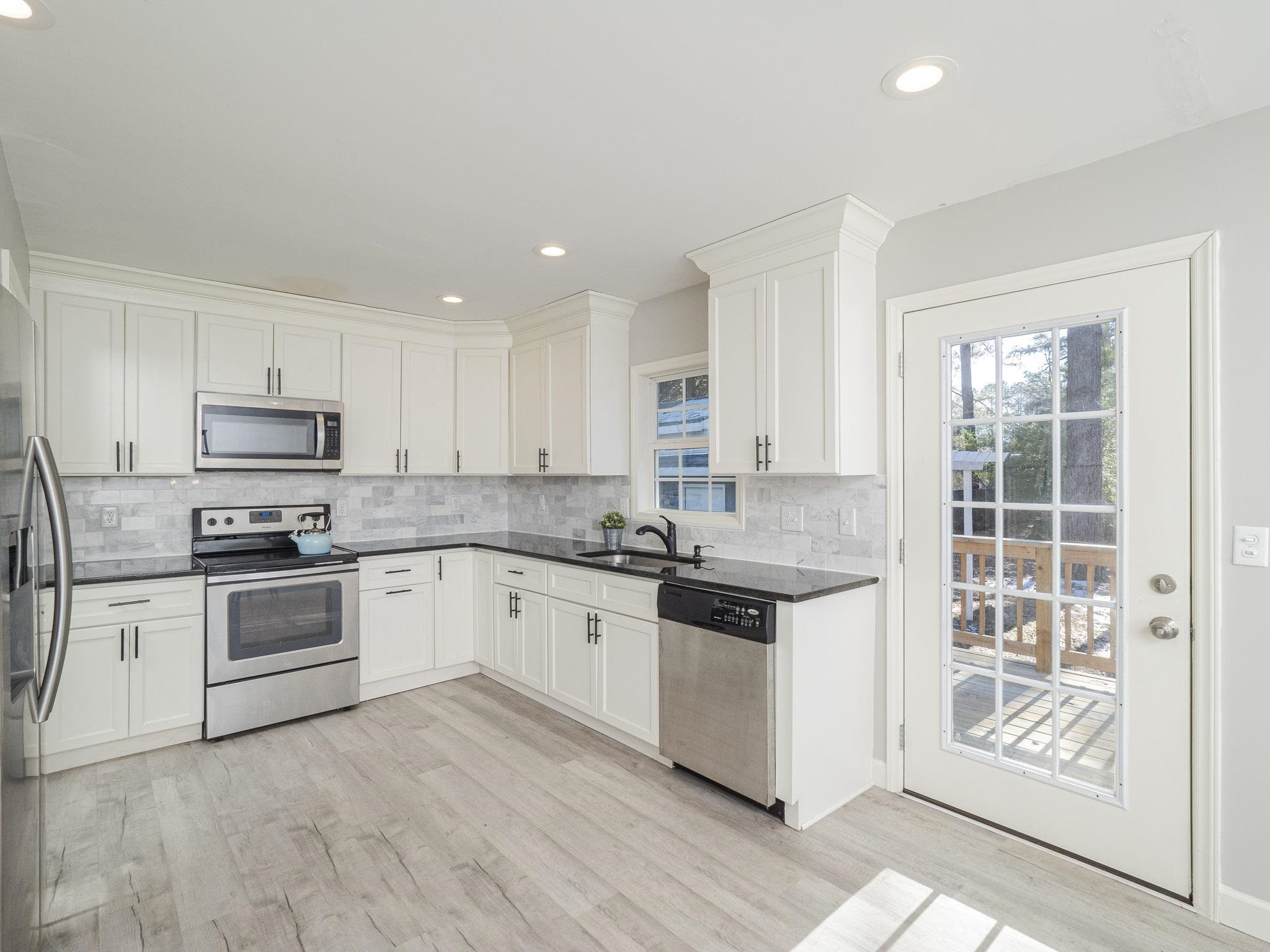 1440 Sedwick Road Durham, NC 27713 - Photo 4 of 23 Renovated Kitchen