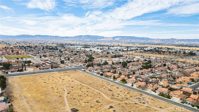 an aerial view of residential building and city view