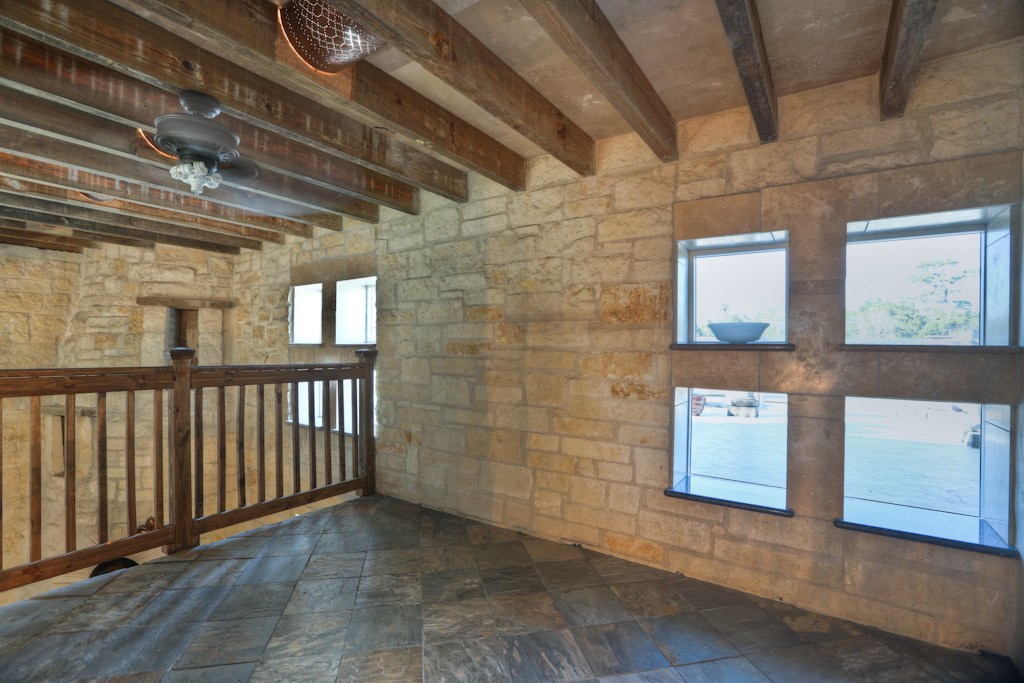 614 Pine Gully Road, Unit LOFT Seabrook, TX 77586 - Photo 11 of 29 Loft with stone walls and slate floor .