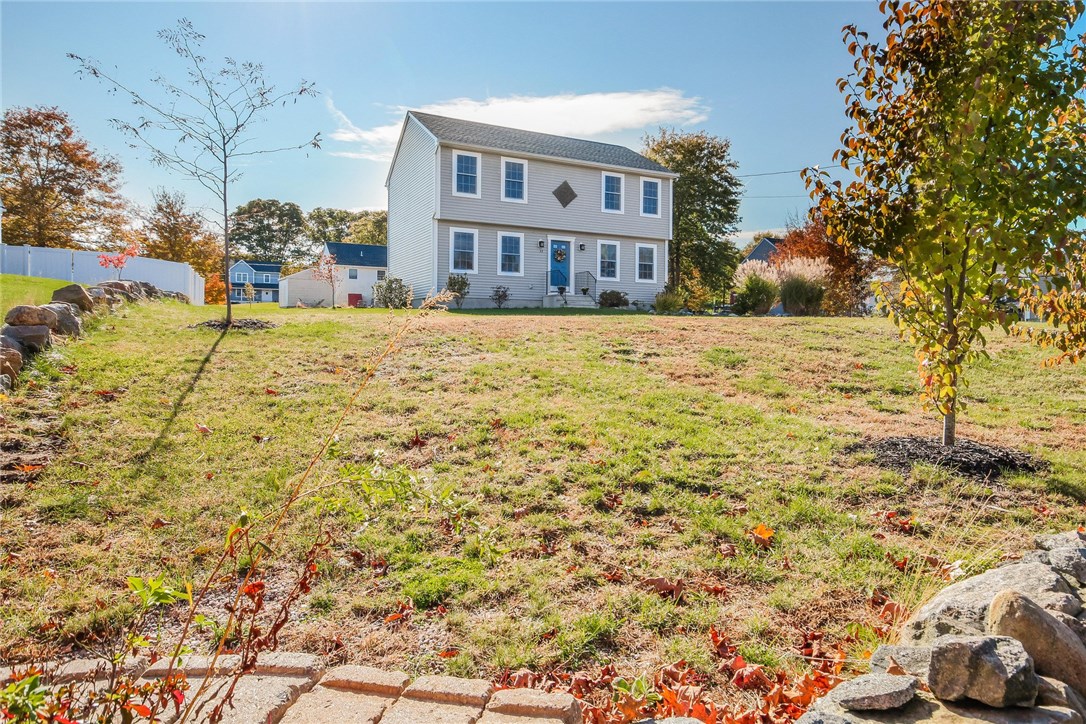 33 Fieldstone Way Westerly, RI 02891 - Photo 3 of 25 Low maintenance vinyl siding and landscaping.