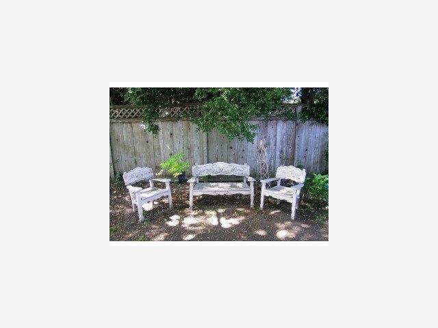 3490 Rio Road Carmel, CA 93923 - Photo 8 of 9 a picture of a bench in a backyard