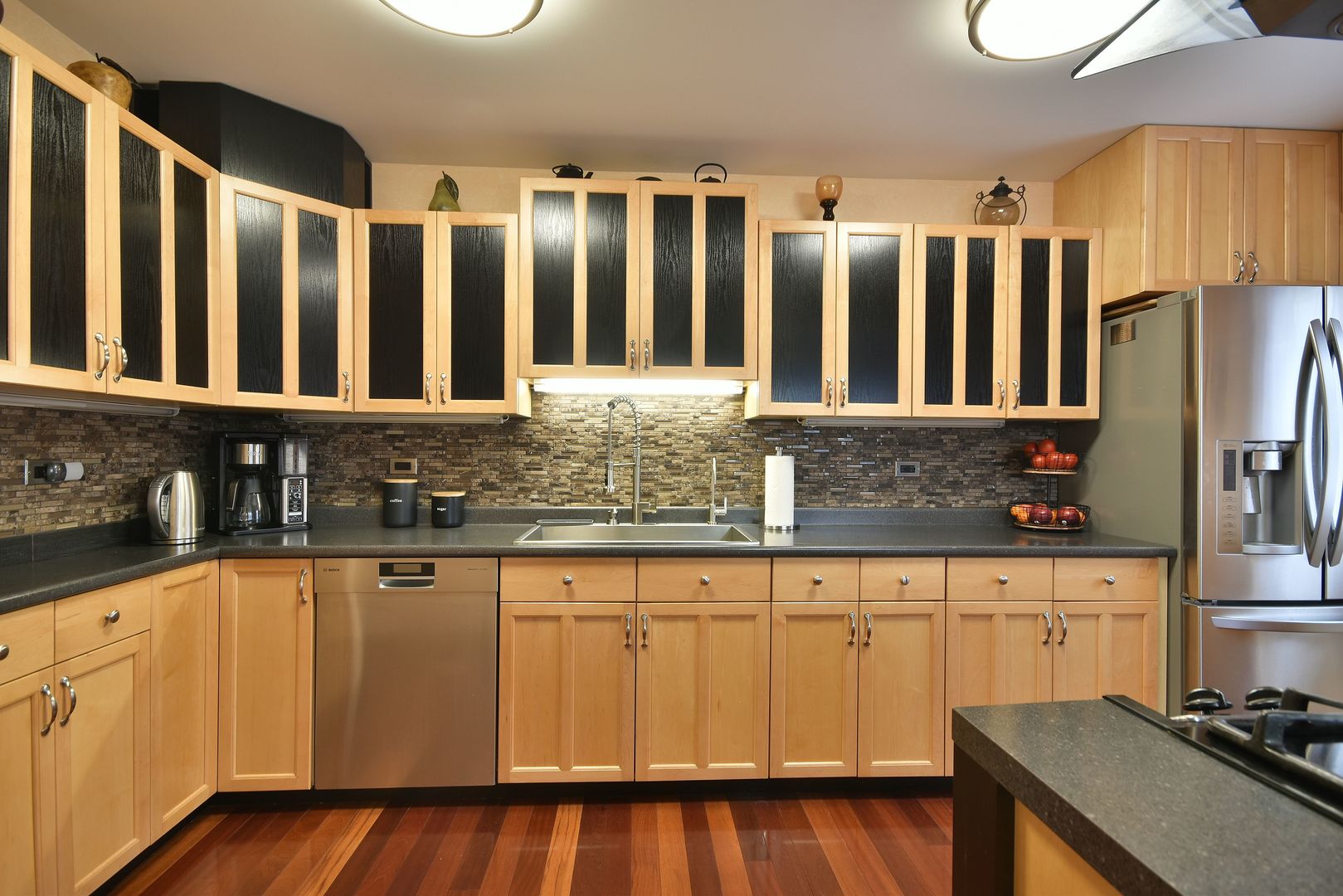 632 Merle Lane Wheeling, IL 60090 - Photo 12 of 46 a kitchen with stainless steel appliances granite countertop a refrigerator a sink and white cabinets