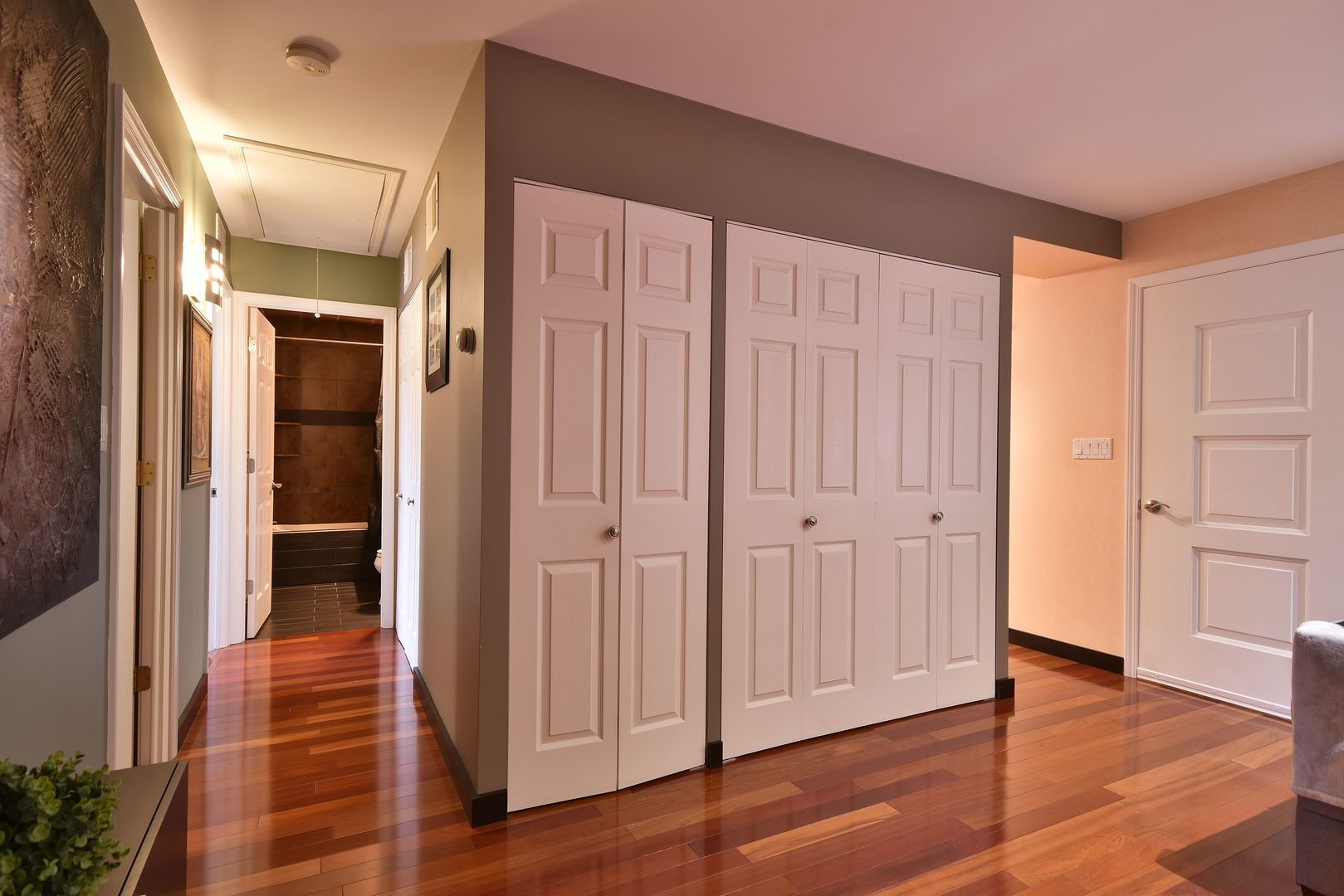 632 Merle Lane Wheeling, IL 60090 - Photo 19 of 46 a view of a hallway with wooden floor and closet area