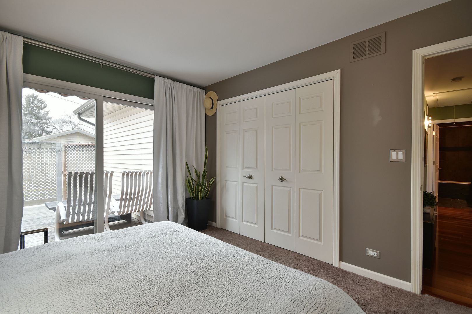 632 Merle Lane Wheeling, IL 60090 - Photo 21 of 46 a bedroom with a bed and a large window