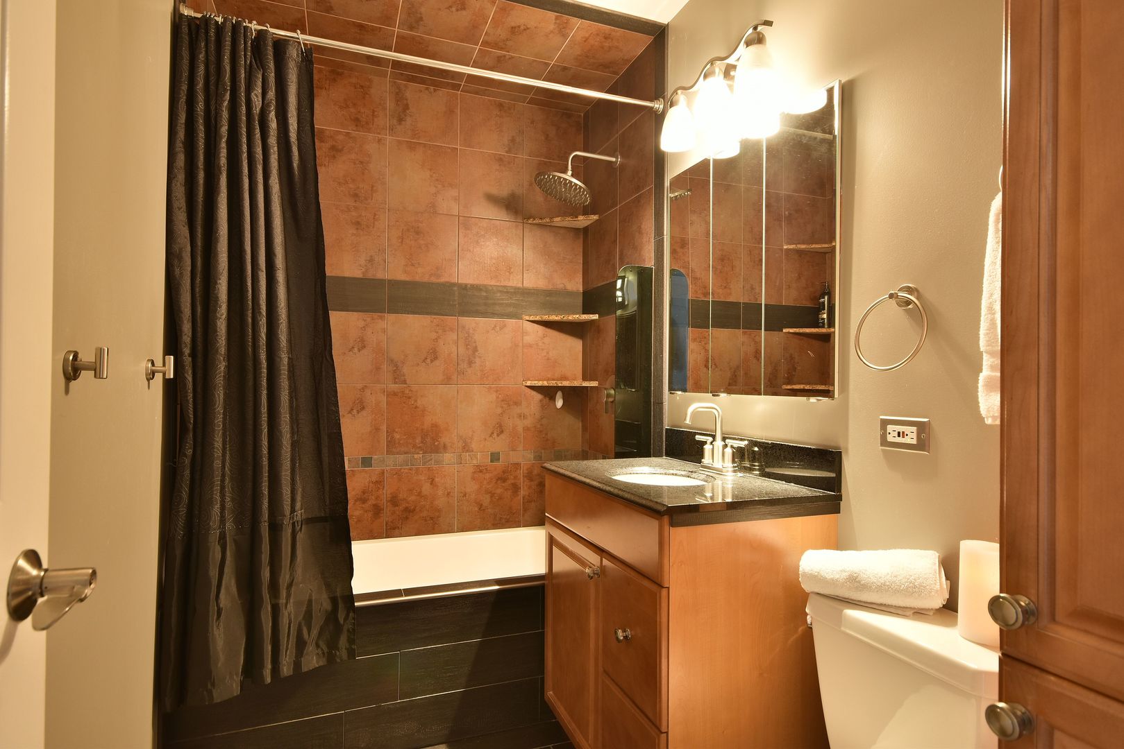 632 Merle Lane Wheeling, IL 60090 - Photo 22 of 46 a bathroom with a granite countertop sink toilet and shower