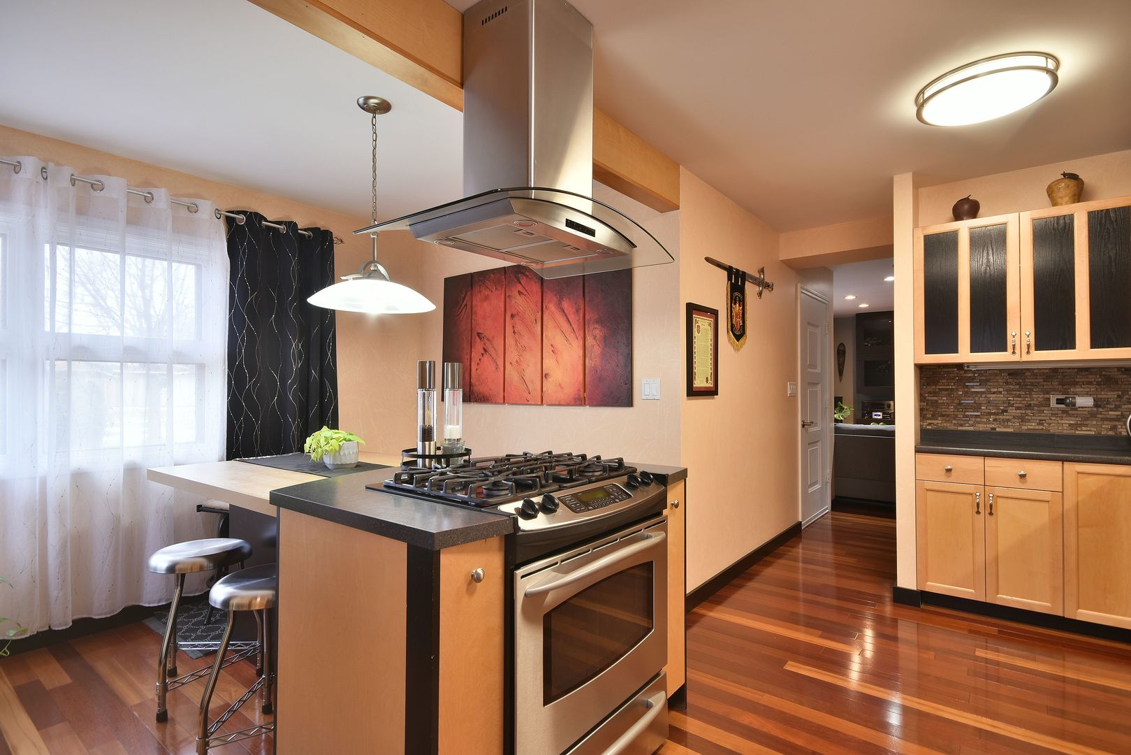 632 Merle Lane Wheeling, IL 60090 - Photo 4 of 46 a kitchen with stainless steel appliances granite countertop a stove a sink and a refrigerator