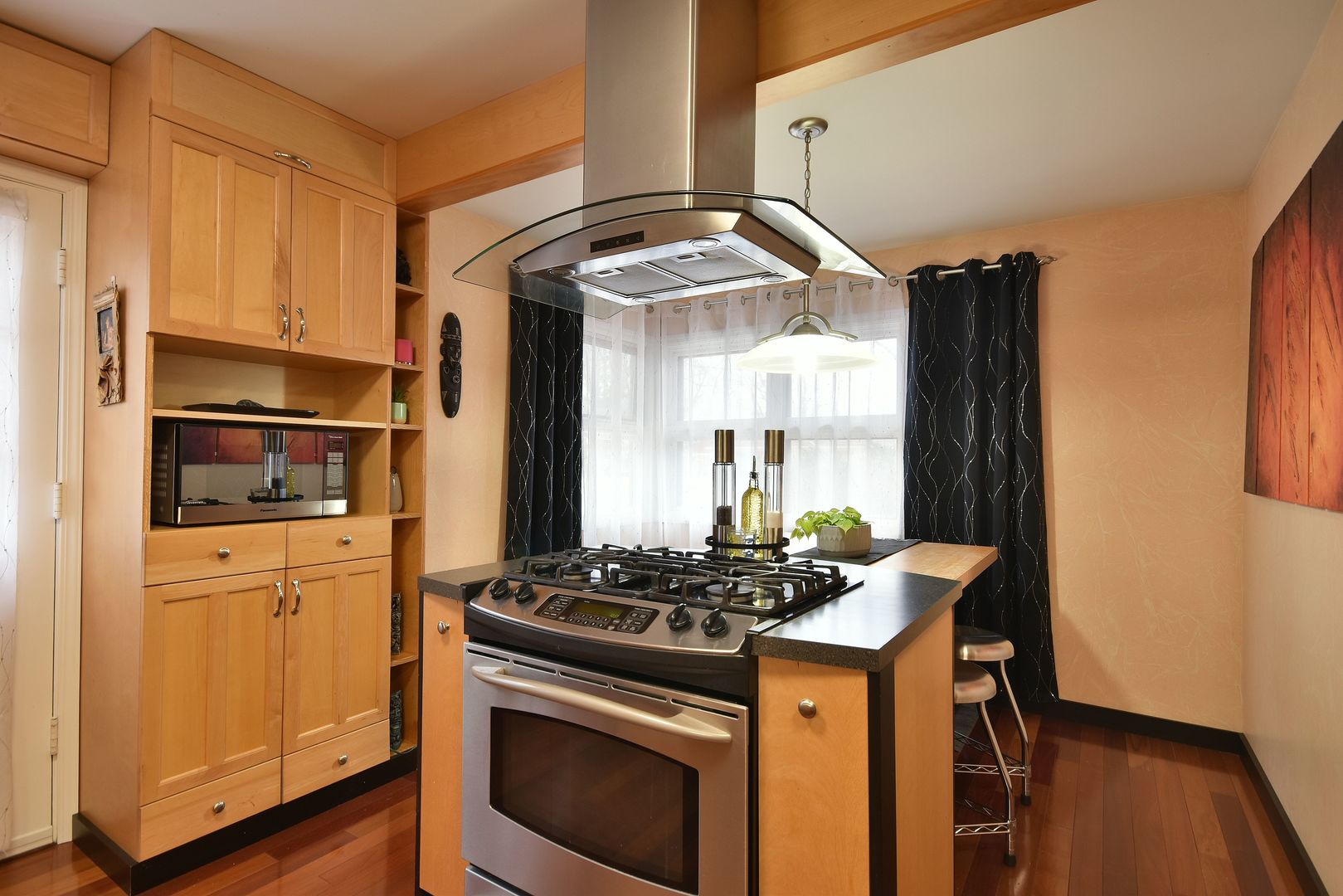632 Merle Lane Wheeling, IL 60090 - Photo 9 of 46 a kitchen with stainless steel appliances a stove a refrigerator and cabinets