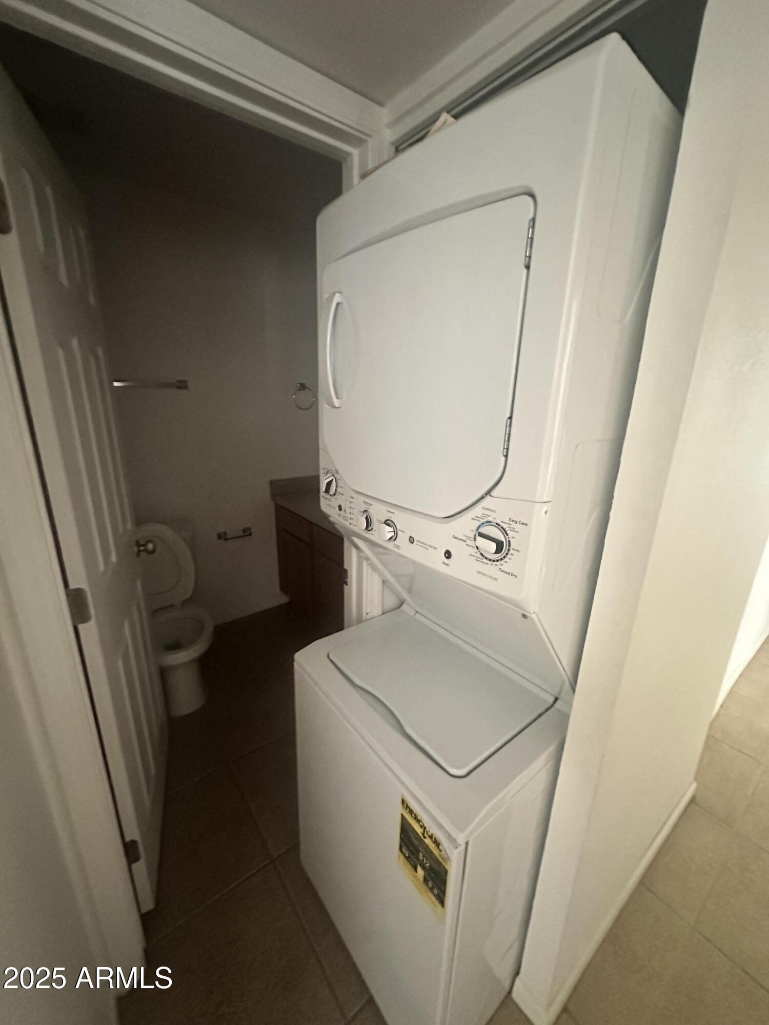 424 West Brown Road, Unit 122 Mesa, AZ 85201 - Photo 7 of 11 a utility room with dryer and washer
