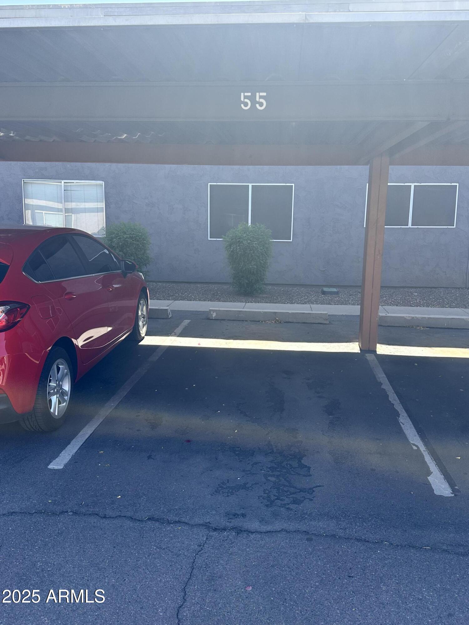 424 West Brown Road, Unit 122 Mesa, AZ 85201 - Photo 10 of 11 a view of car parked