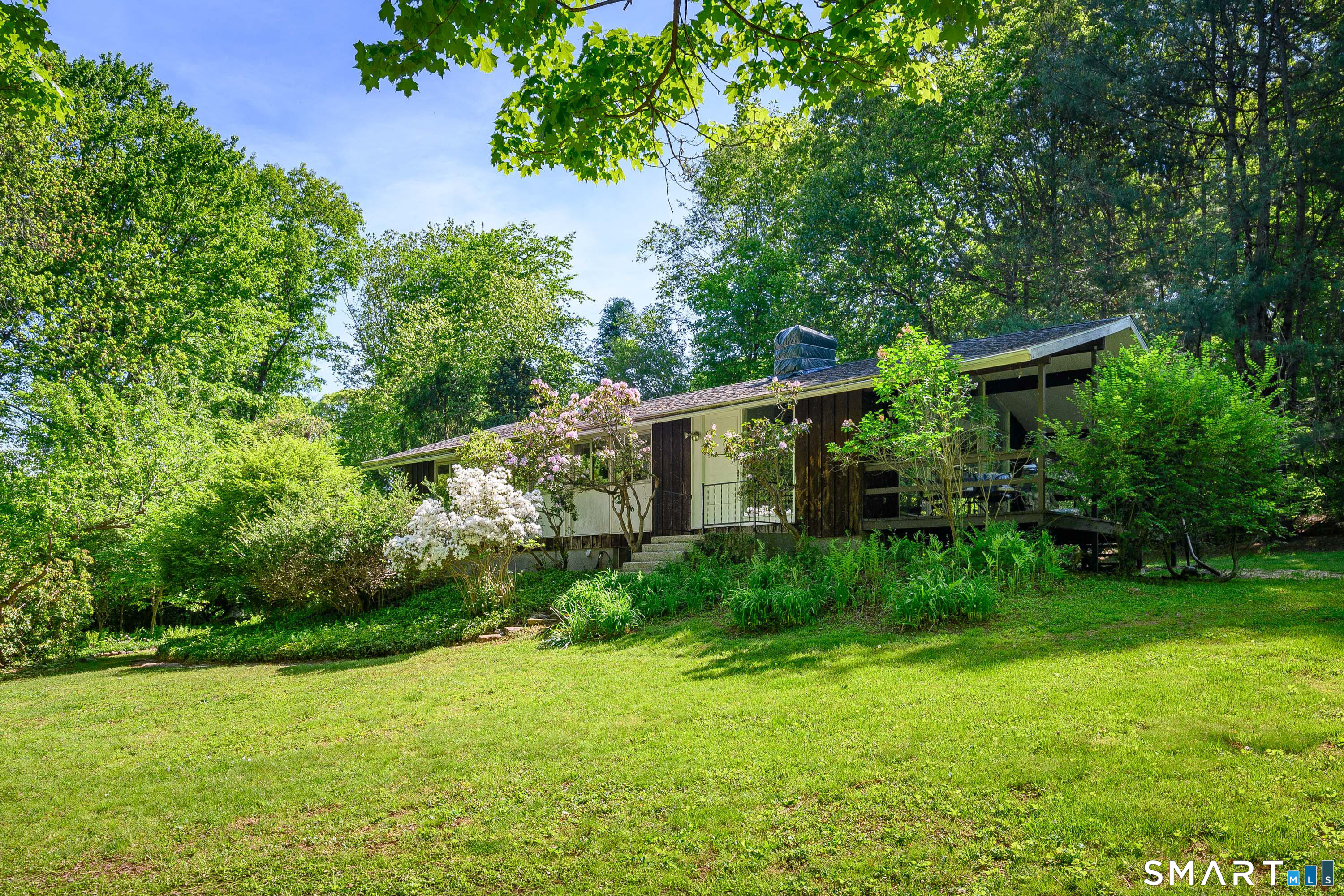 4 Pepper Pond Road Sherman, CT 06784 - Photo 2 of 33 a view of a back yard
