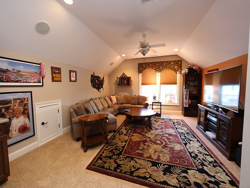 12913 Baybriar Drive Raleigh, NC 27613 - Photo 20 of 25 The bonus room has a dry bar with mini fridge and built in speakers. There is a walk-in closet in case you need to use it as a bedroom or just for more storage. Bonus Room