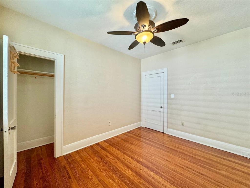 3112 West Palmira Avenue Tampa, FL 33629 - Photo 19 of 37 a view of empty room with wooden floor