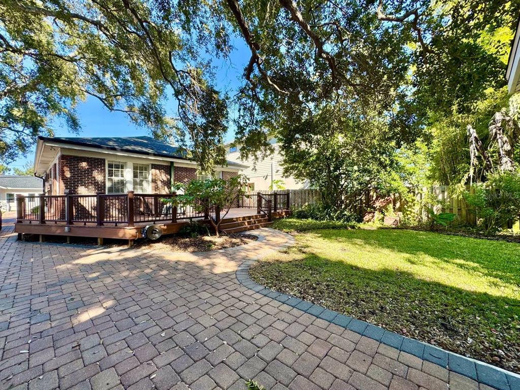 3112 West Palmira Avenue Tampa, FL 33629 - Photo 28 of 37 a view of a house with backyard and sitting area