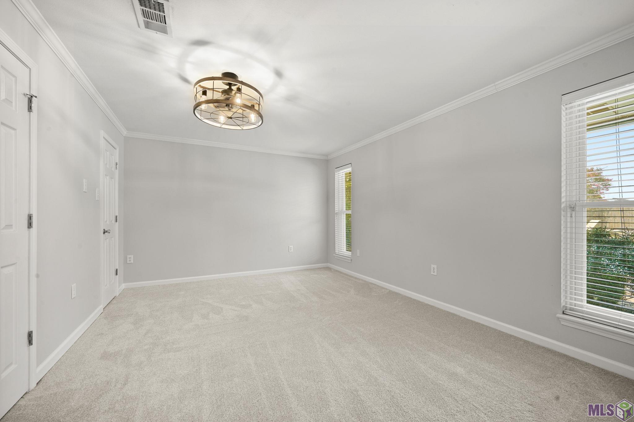 7726 Lew Hoad Avenue Baton Rouge, LA 70810 - Photo 20 of 36 Primary Bedroom- New Carpet