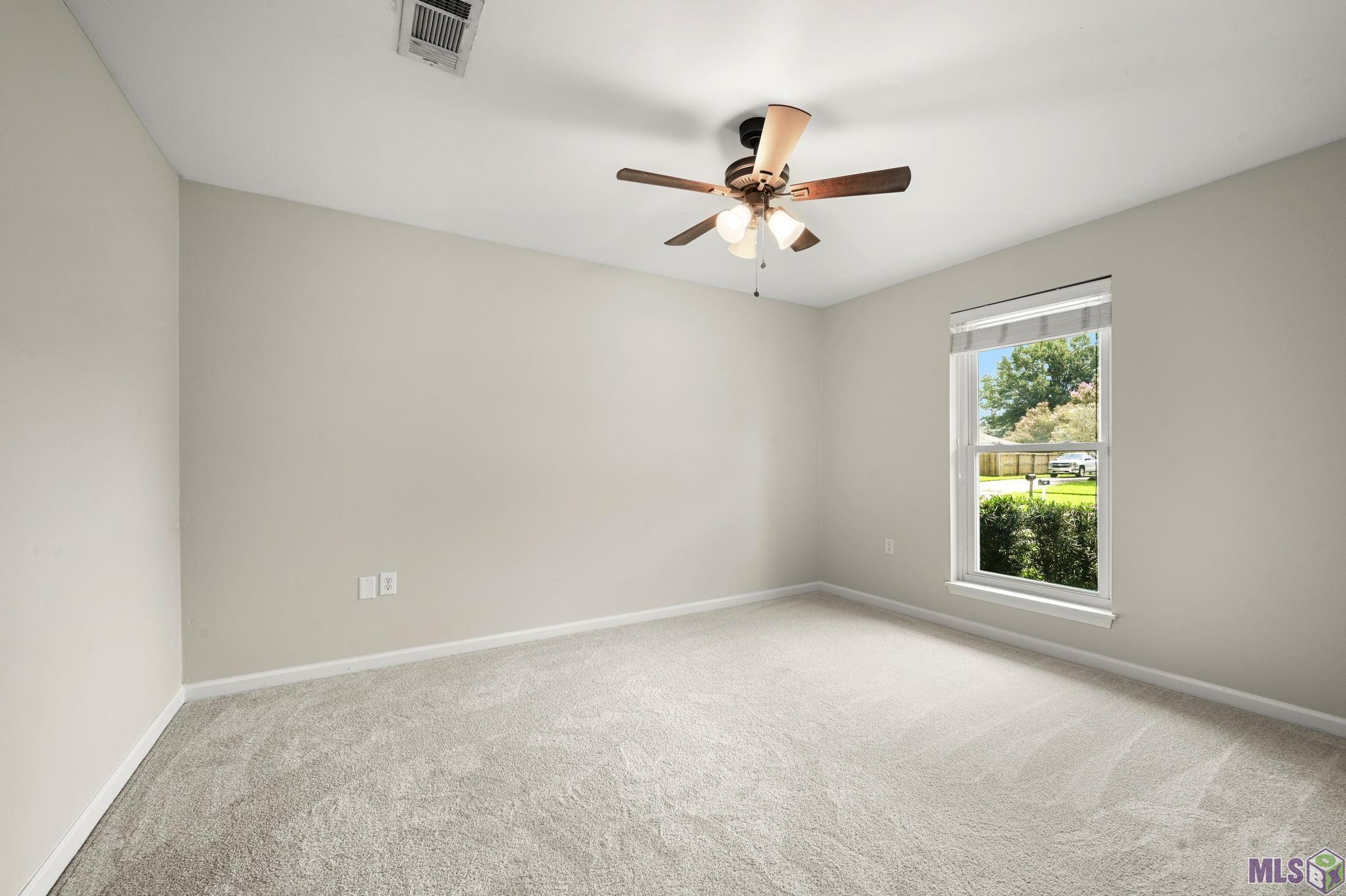 7726 Lew Hoad Avenue Baton Rouge, LA 70810 - Photo 27 of 36 Back Bedroom