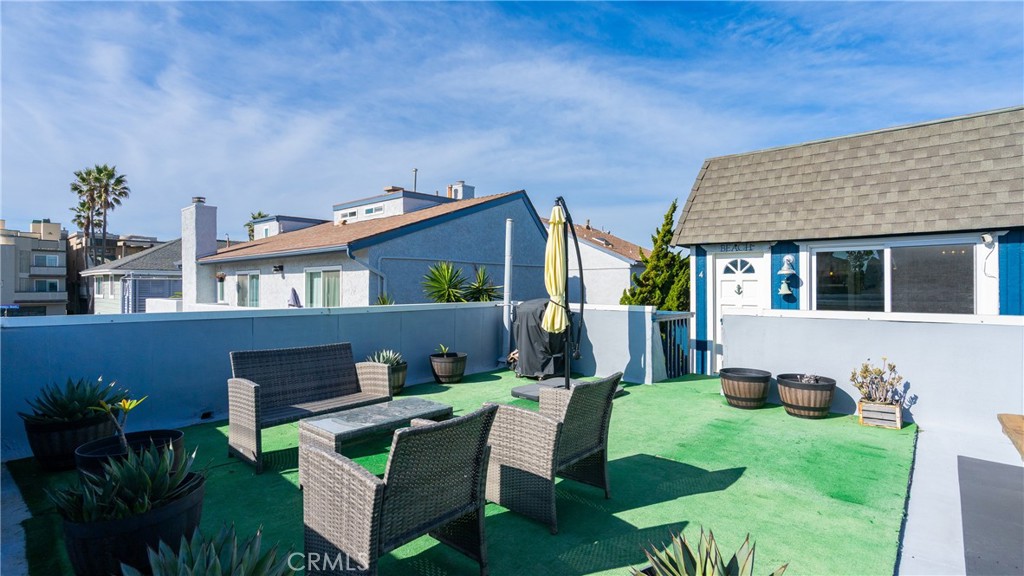 5510 Driftwood Street, Unit 4 Oxnard, CA 93035 - Photo 21 of 23 a view of house with a backyard