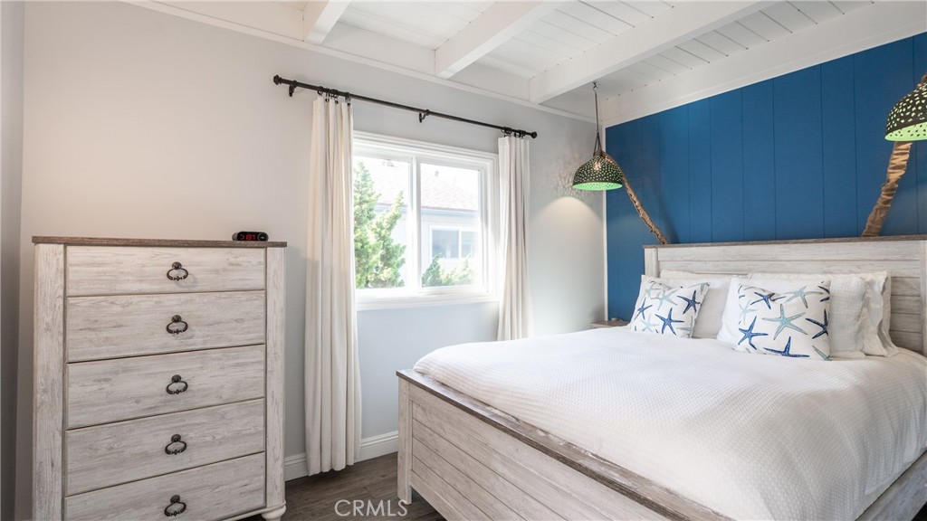 5510 Driftwood Street, Unit 4 Oxnard, CA 93035 - Photo 10 of 23 a bedroom with a bed and a window