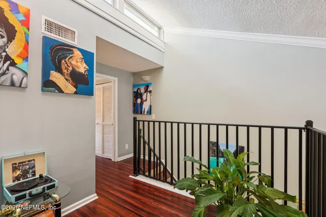 a view of a hallway with workspace