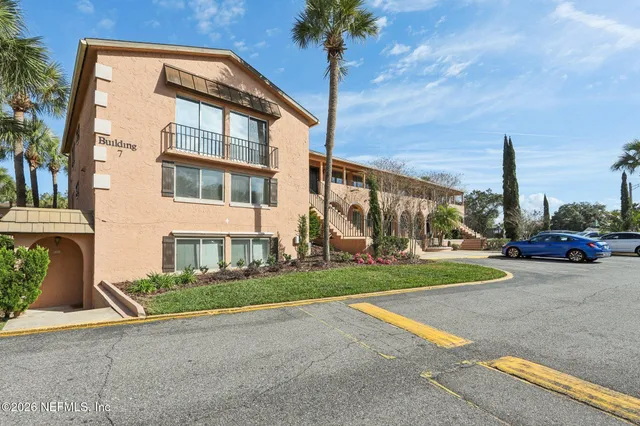 a view of a street in front of a building