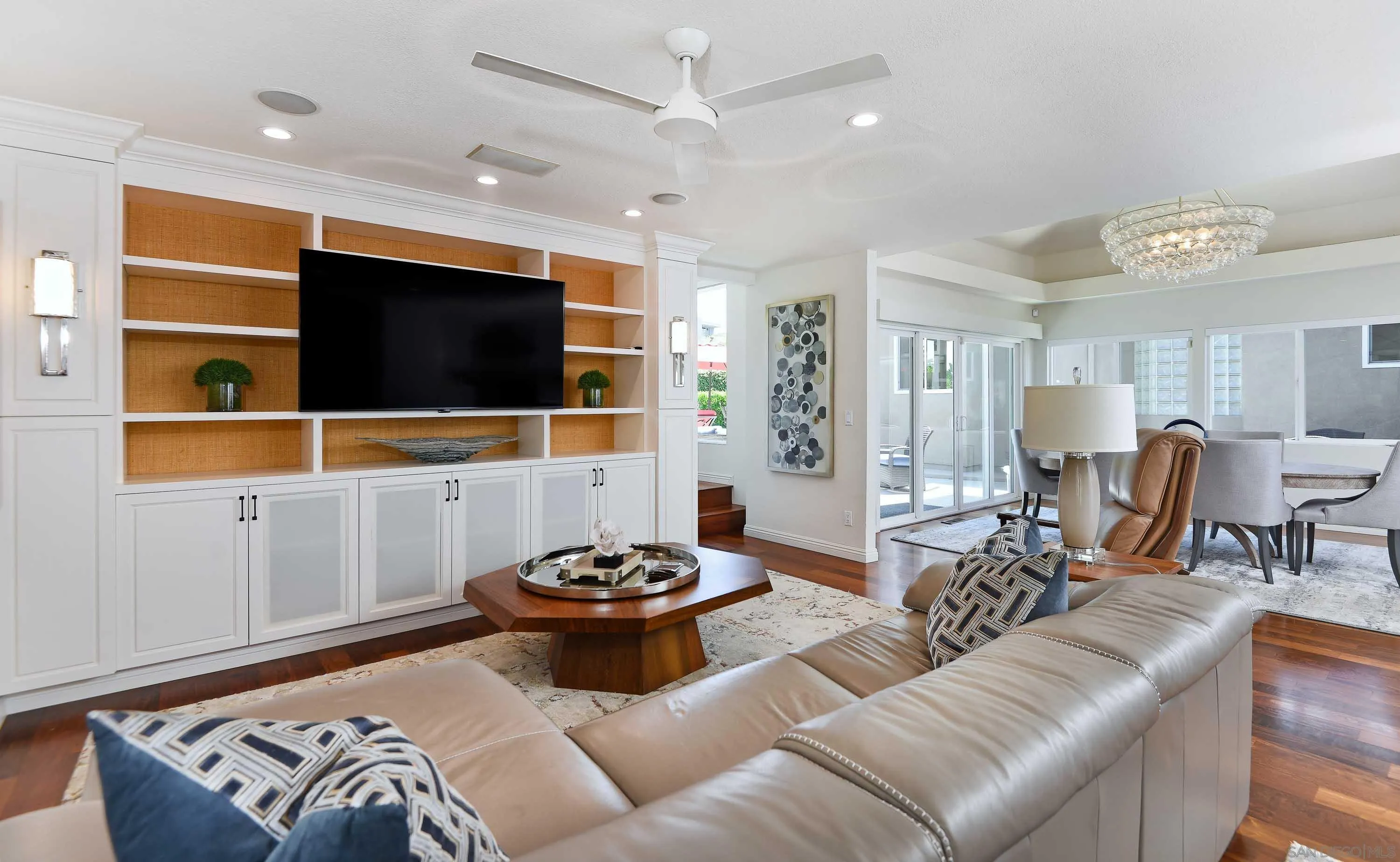 5459 Moonlight Lane La Jolla, CA 92037 - Photo 13 of 32 a living room with furniture and a flat screen tv