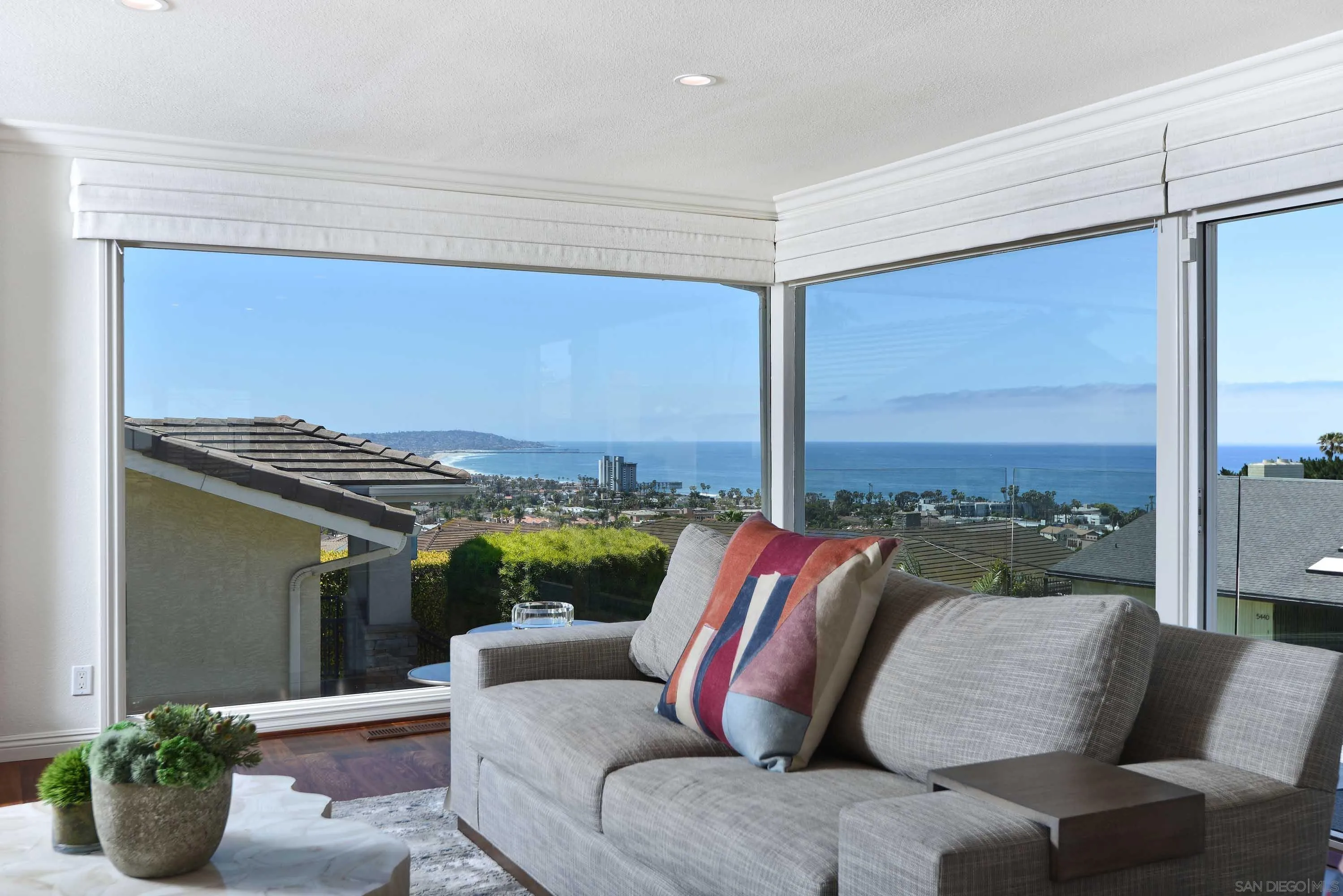 5459 Moonlight Lane La Jolla, CA 92037 - Photo 16 of 32 a living room with couch and a large window