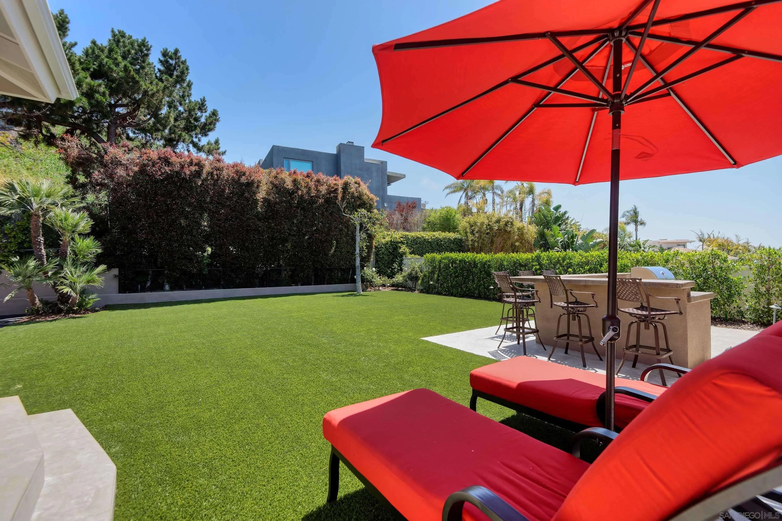 5459 Moonlight Lane La Jolla, CA 92037 - Photo 21 of 32 a view of yard with patio and outdoor seating