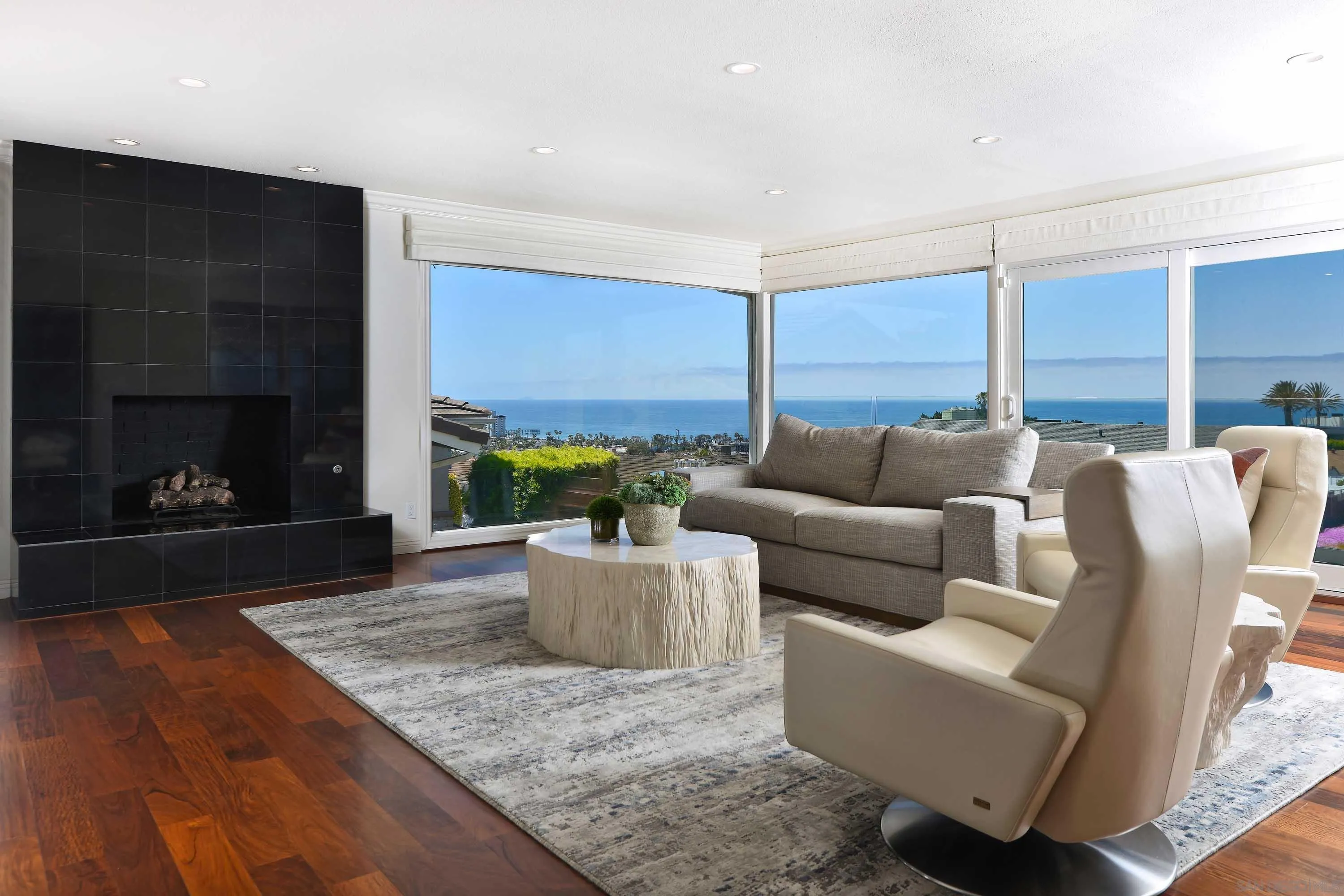 5459 Moonlight Lane La Jolla, CA 92037 - Photo 4 of 32 a living room with furniture and a fireplace