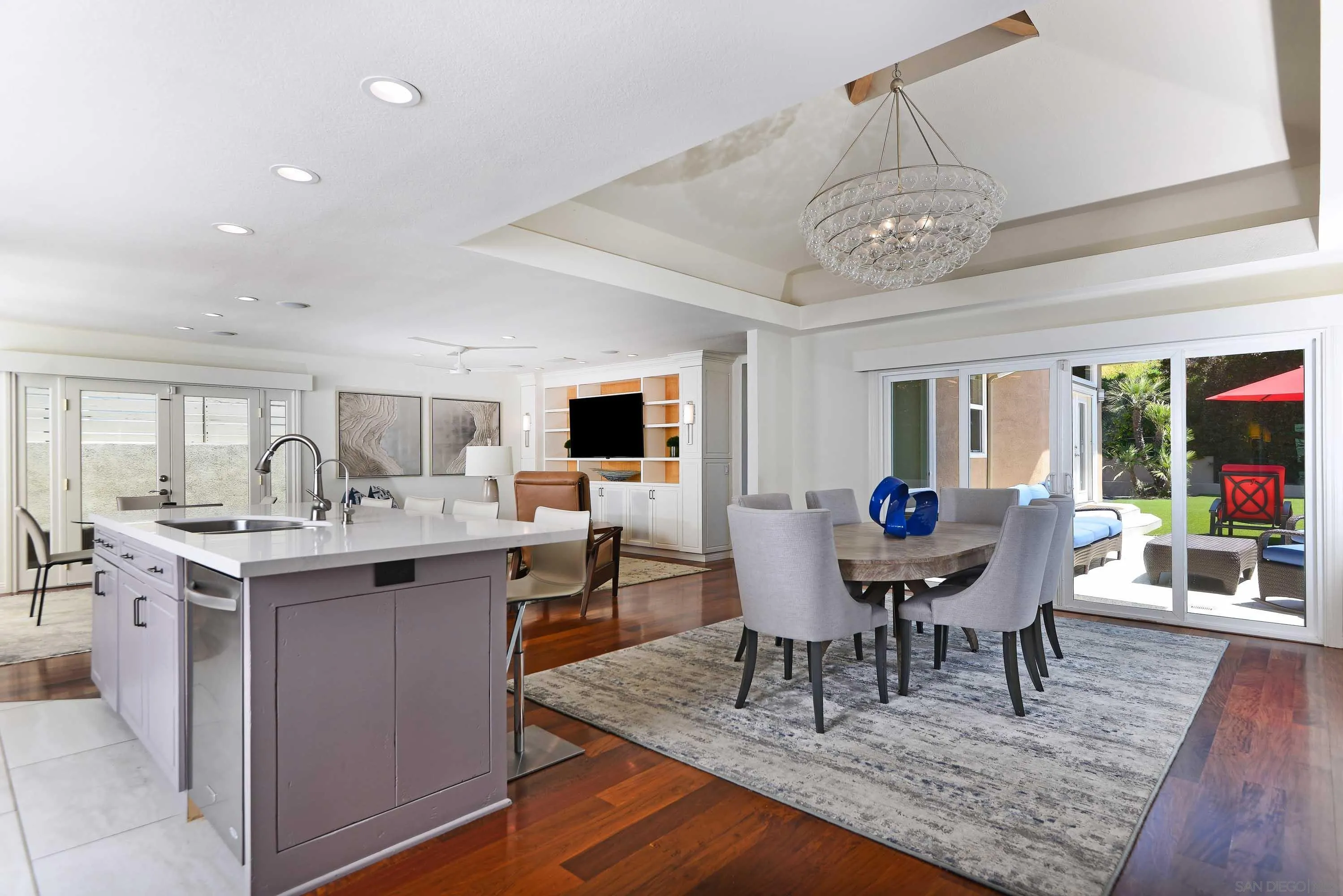 5459 Moonlight Lane La Jolla, CA 92037 - Photo 6 of 32 a view of a dining room with furniture window and wooden floor