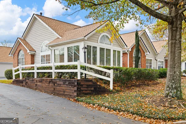 front view of a house with a small yard