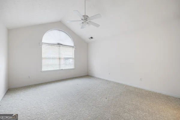 an empty room with an entryway