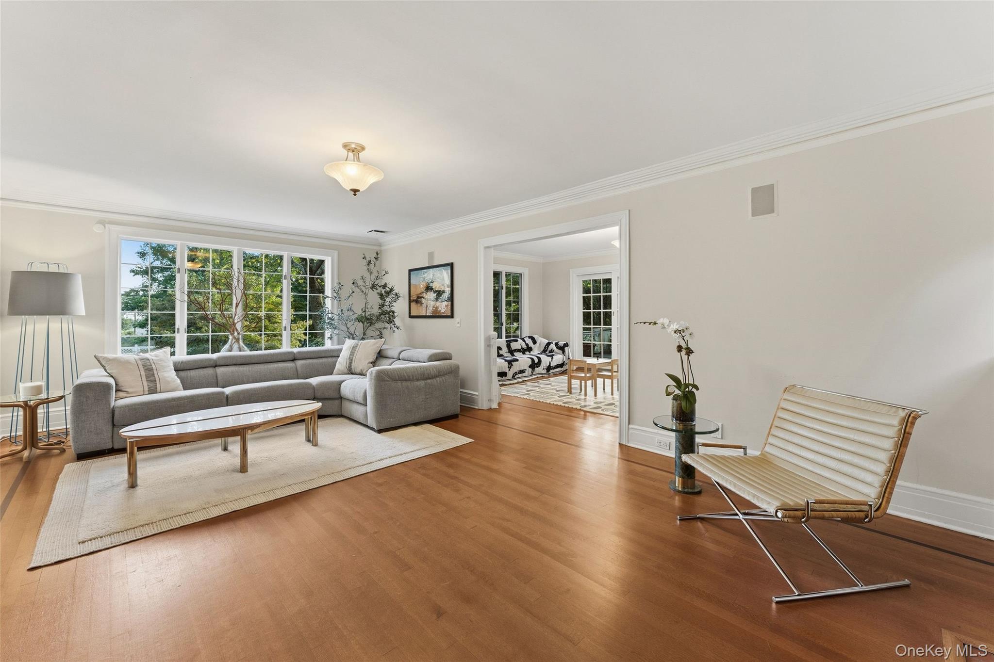 2 Dellwood Road Bronxville, NY 10708 - Photo 6 of 46 Formal Living Room looking into the sunroom.