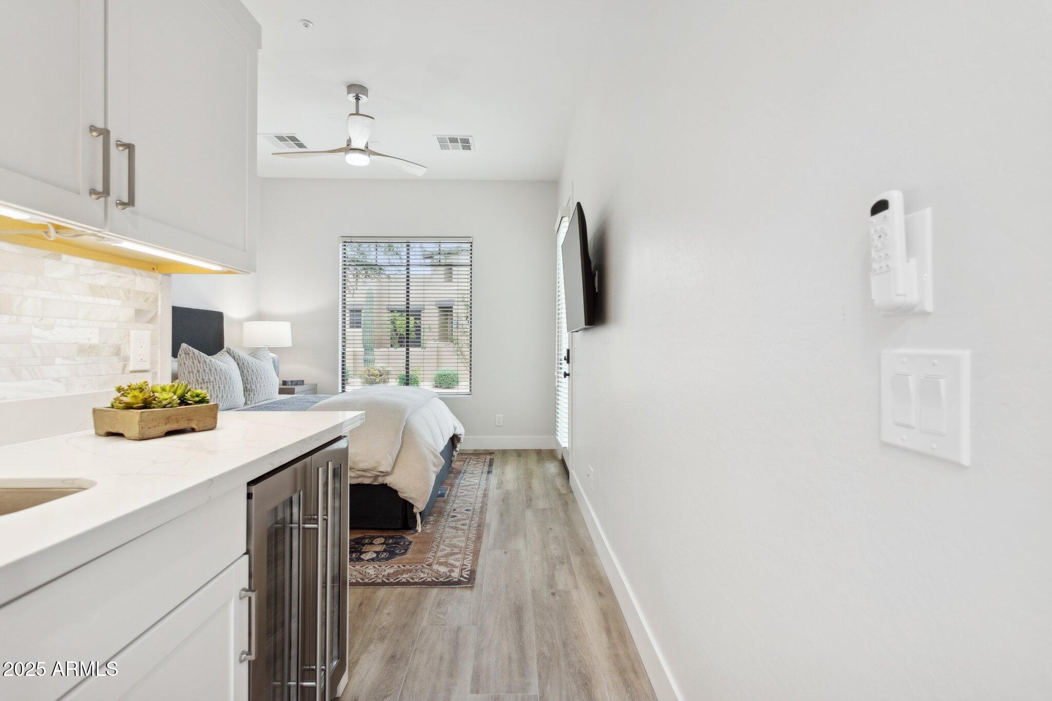 9270 East Thompson Peak Parkway, Unit 364 Scottsdale, AZ 85255 - Photo 22 of 45 a kitchen with a sink a stove and cabinets
