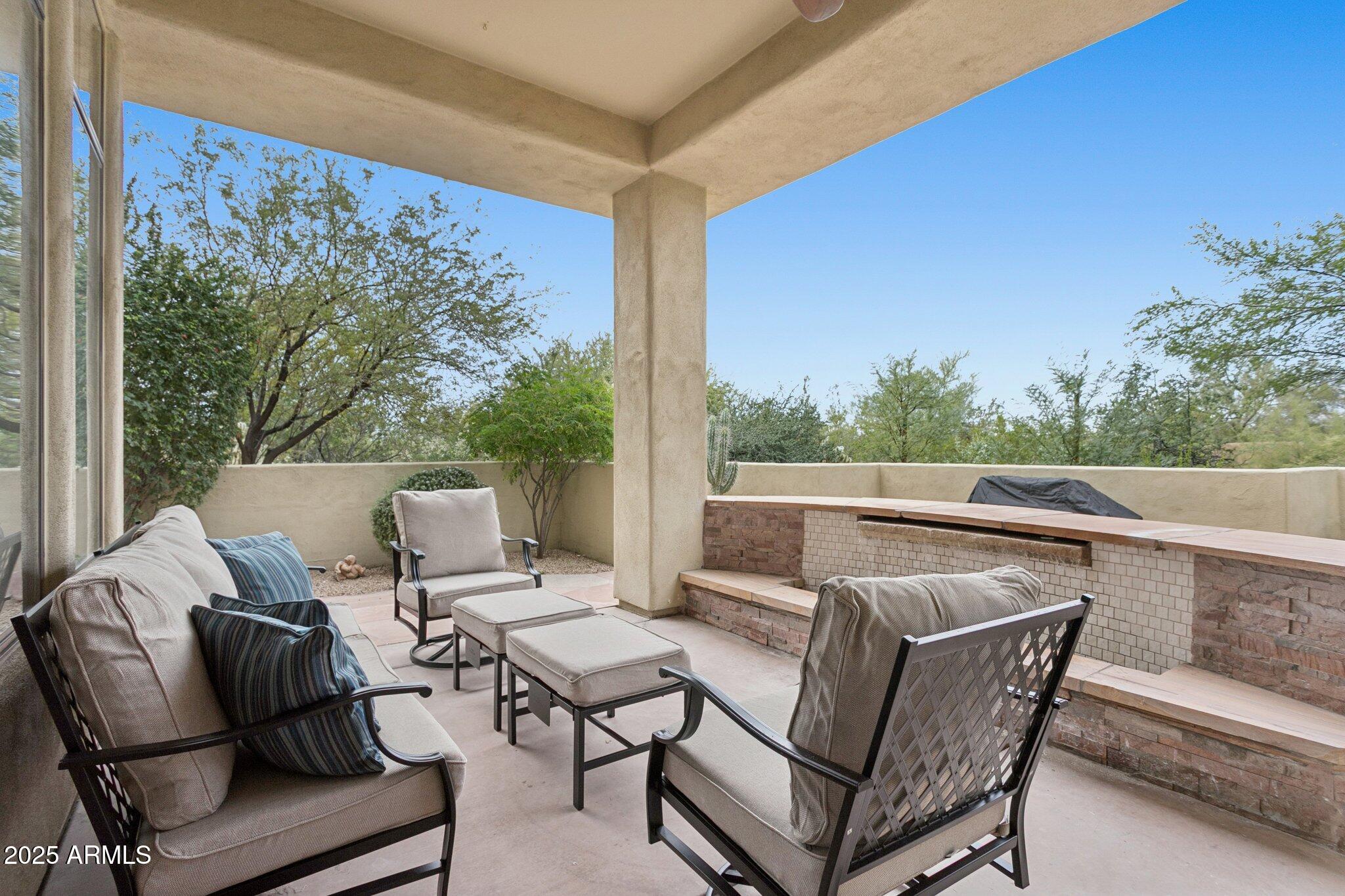 9270 East Thompson Peak Parkway, Unit 364 Scottsdale, AZ 85255 - Photo 28 of 45 a outdoor living space with furniture