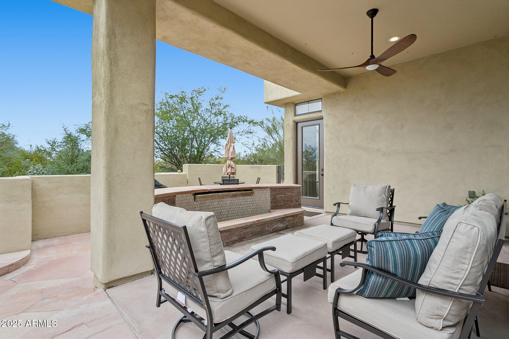 9270 East Thompson Peak Parkway, Unit 364 Scottsdale, AZ 85255 - Photo 29 of 45 a view of a dining room with furniture window and outside view