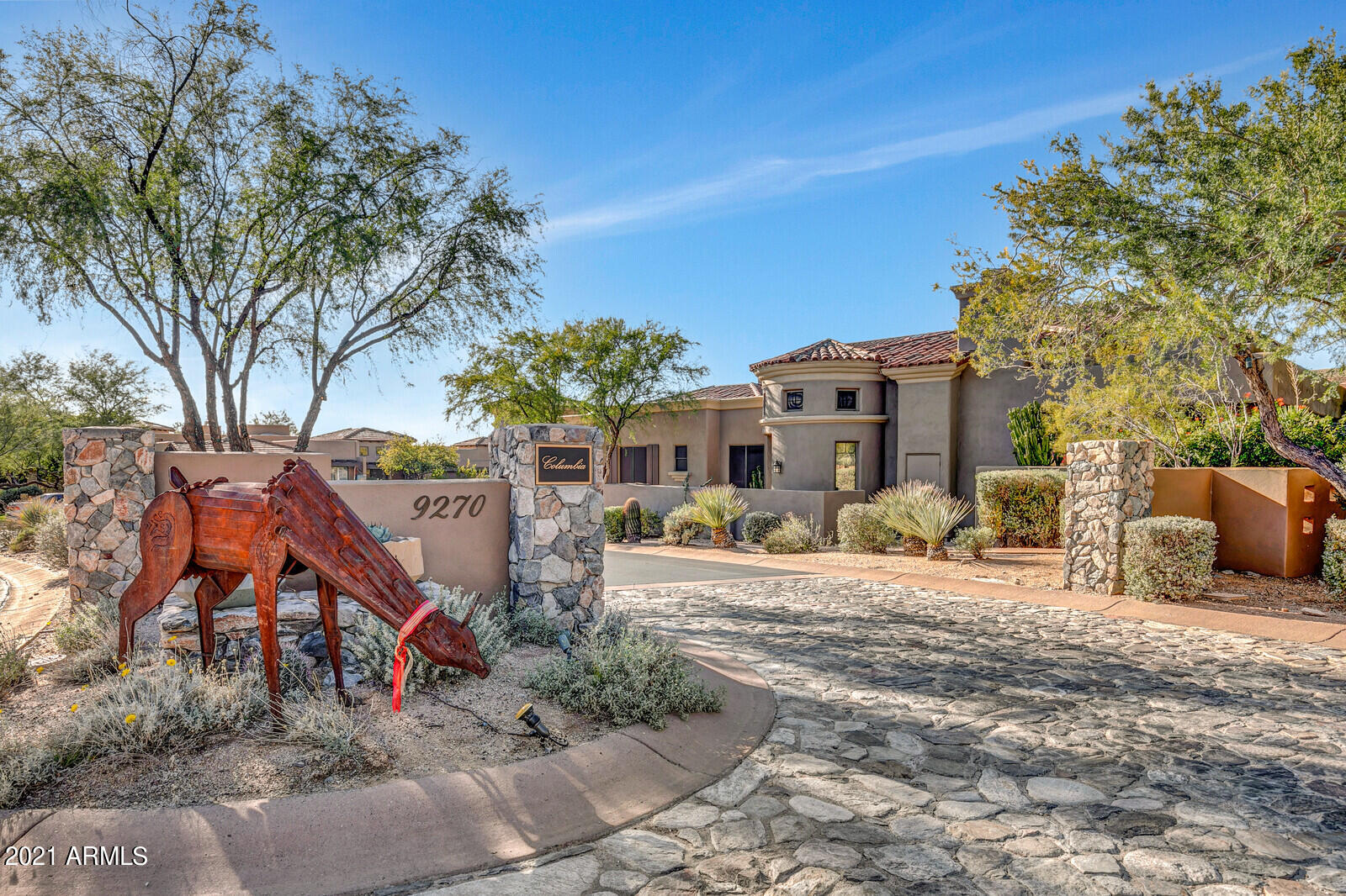 9270 East Thompson Peak Parkway, Unit 364 Scottsdale, AZ 85255 - Photo 32 of 45 a view of a house with a yard and furniture