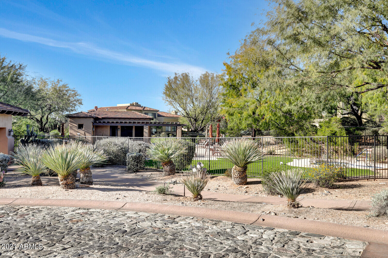 9270 East Thompson Peak Parkway, Unit 364 Scottsdale, AZ 85255 - Photo 33 of 45 a view of two chairs and a table in the patio