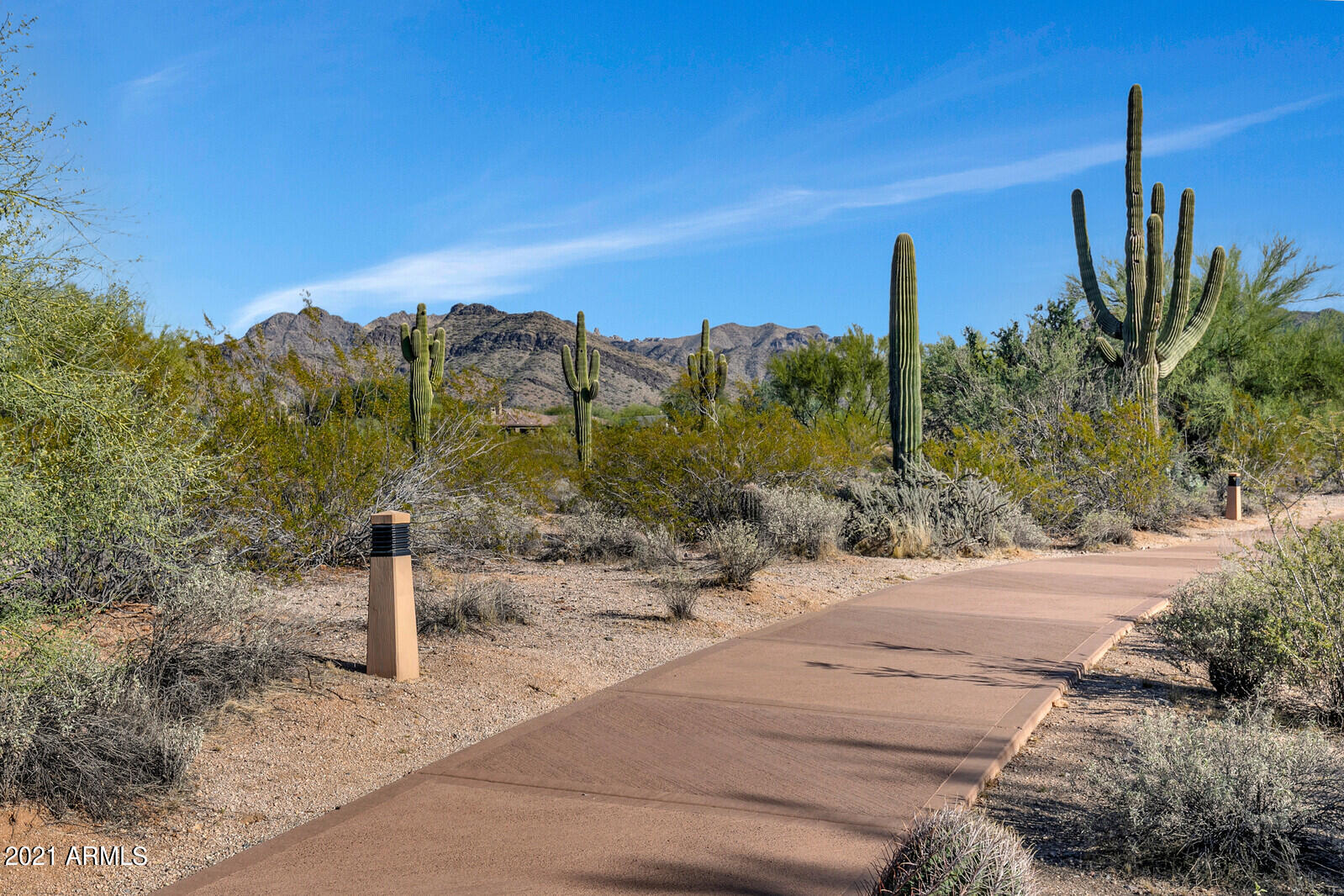 9270 East Thompson Peak Parkway, Unit 364 Scottsdale, AZ 85255 - Photo 35 of 45 a view of a street with a building in the background
